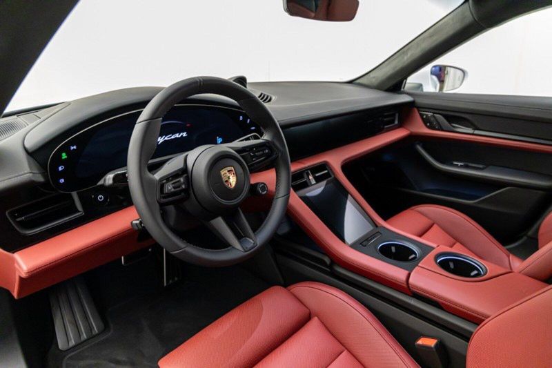 2023 Porsche Taycan GTS in a Carrara White Metallic exterior color and Bordeaux Red/Blackinterior. Lotus Manhattan 347-395-5714 lotusmanhattan.com 