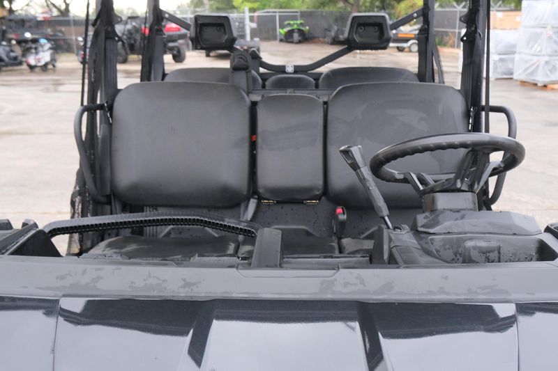 NEW 2026 CAN-AM DEFENDER MAX DPS HD9  in a STEALTH BLACK exterior color. Family PowerSports (877) 886-1997 familypowersports.com 