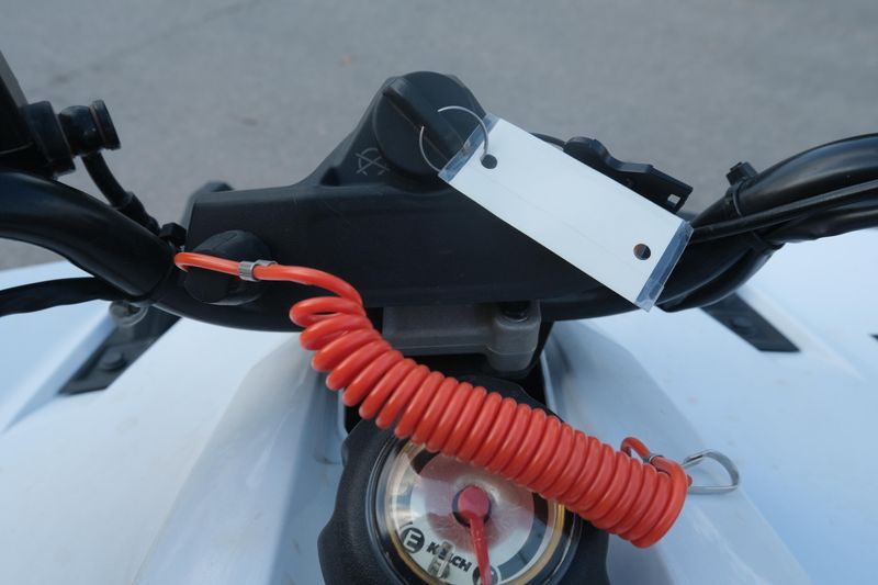 Used 2023 Polaris OUTLAW 70 EFI BRIGHT WHITE AND RED Image 14