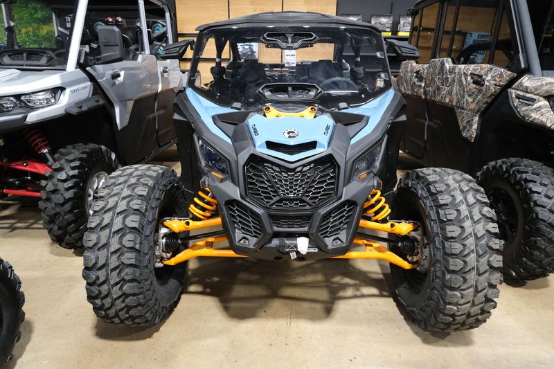 2025 CAN-AM MAVERICK X3 MAX DS TURBO SCANDI BLUE AND ORANGE CRUSH in a SCANDI BLUE AND ORANGE CRUSH exterior color. Family PowerSports (877) 886-1997 familypowersports.com 