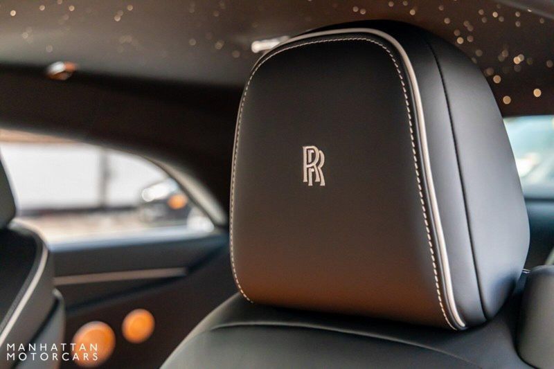 2024 Rolls-Royce Spectre  in a Tempest Grey exterior color and Black with Mandarin Accentsinterior. Lotus Manhattan 347-395-5714 lotusmanhattan.com 