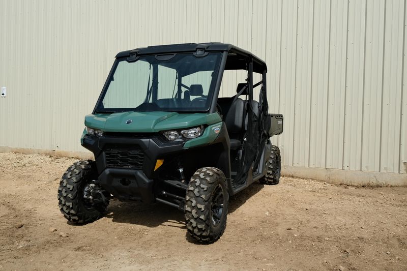 NEW 2026 CAN-AM DEFENDER MAX DPS HD7  in a COMPASS GREEN exterior color. Family PowerSports (877) 886-1997 familypowersports.com 