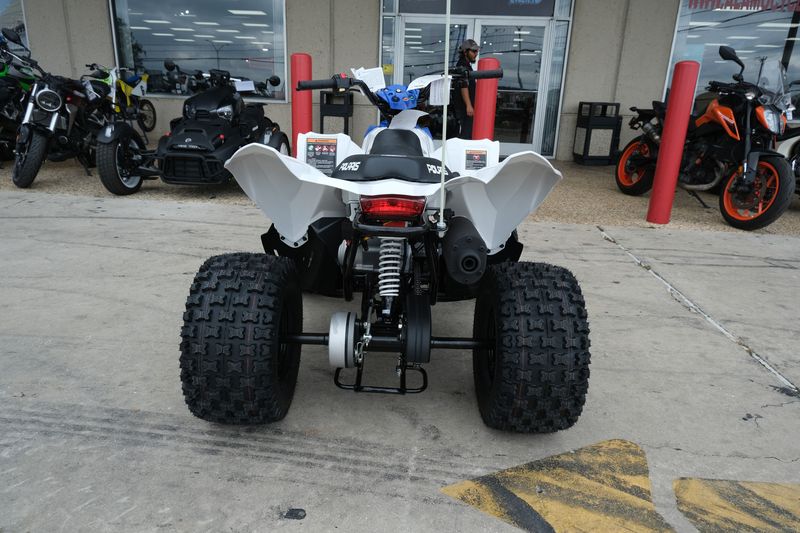 2025 Polaris OUTLAW 110 EFI BRIGHT WHITE AND BLUE Image 12