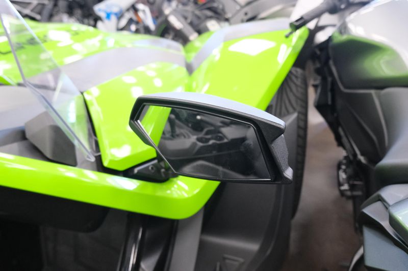 NEW 2025 POLARIS SLINGSHOT SL MANUAL  in a LIQUID LIME exterior color. Family PowerSports (877) 886-1997 familypowersports.com 