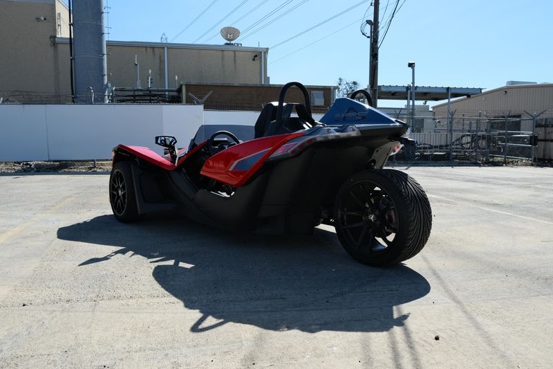 NEW 2025 POLARIS SLINGSHOT SLR AUTODRIVE  in a ROYAL RED exterior color. Family PowerSports (877) 886-1997 familypowersports.com 
