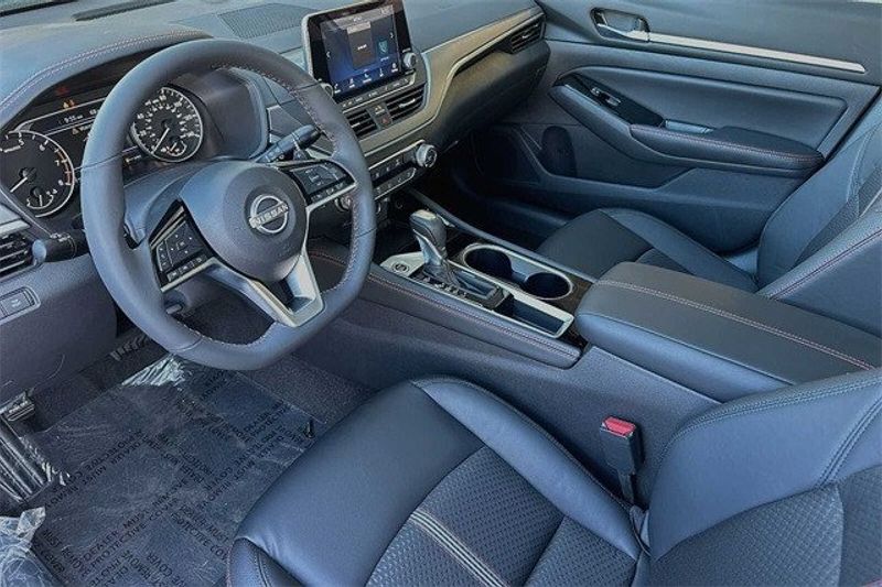 2024 Nissan Altima 2.5 SR in a Gray Sky Pearl exterior color and Sportinterior. BEACH BLVD OF CARS beachblvdofcars.com 