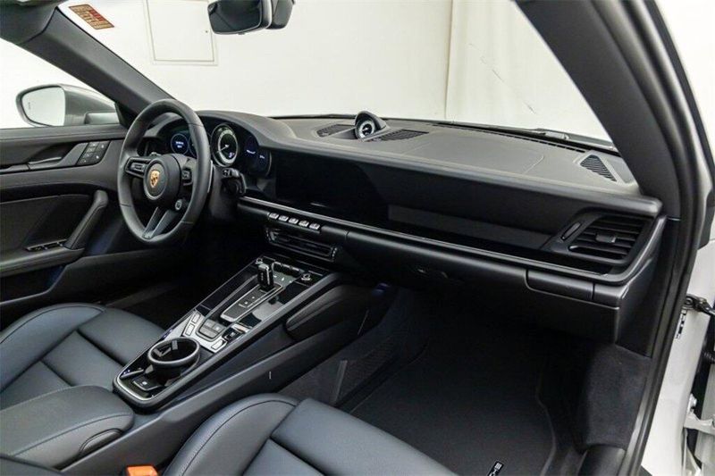 2024 Porsche 911 Carrera T in a Chalk exterior color and Blackinterior. Lotus Manhattan 347-395-5714 lotusmanhattan.com 