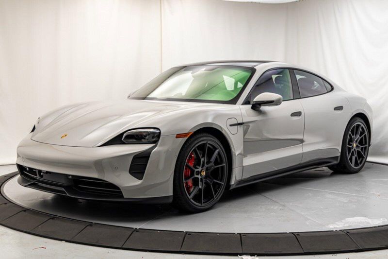 2024 Porsche Taycan GTS in a Chalk exterior color and Blackinterior. Lotus Manhattan 347-395-5714 lotusmanhattan.com 