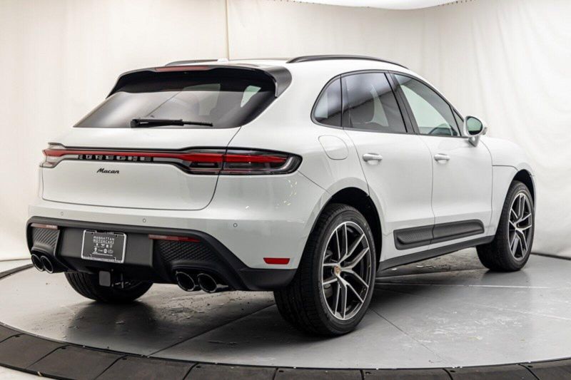 2024 Porsche Macan  in a White exterior color and Black/Bordeaux Redinterior. Lotus Manhattan 347-395-5714 lotusmanhattan.com 