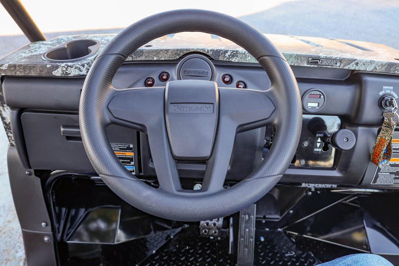 NEW 2026 KAWASAKI MULE 4010 TRANS4X4  in a TRUETIMBER STRATA exterior color. Family PowerSports (877) 886-1997 familypowersports.com 