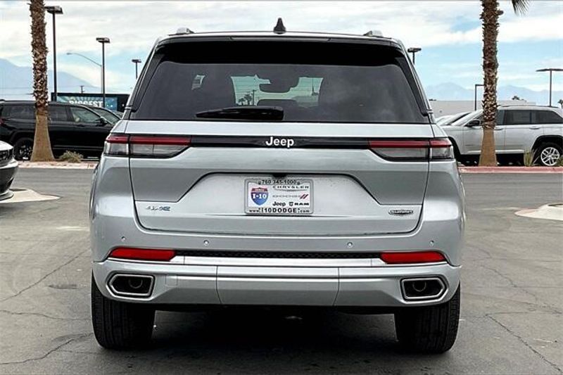 2023 Jeep Grand Cherokee Summit 4xe in a Silver Zynith exterior color and Tupelo/Blkinterior. I-10 Chrysler Dodge Jeep Ram (760) 565-5160 pixelmotiondemo.com 