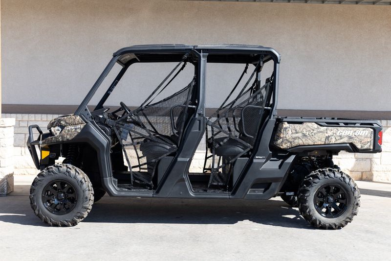 2024 CAN-AM SSV DEF MAX XT 64 HD10 CA 24 in a CAMO exterior color. Family PowerSports (877) 886-1997 familypowersports.com 