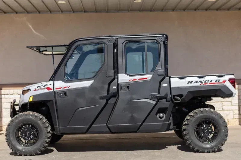 2025 Polaris RANGER CREW XP 1000 NORTHSTAR TRAIL BOSS EDITION CRYSTAL WHITE WITH PERFORMANCE RED ACCENTSImage 1