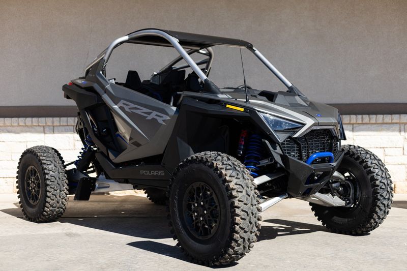 2024 POLARIS RZR PRO R ULTIMATE  MATTE HEAVY METAL in a SILVER exterior color. Family PowerSports (877) 886-1997 familypowersports.com 