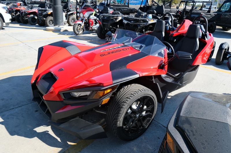 NEW 2025 POLARIS SLINGSHOT S AUTODRIVE  in a SLINGSHOT RED exterior color. Family PowerSports (877) 886-1997 familypowersports.com 