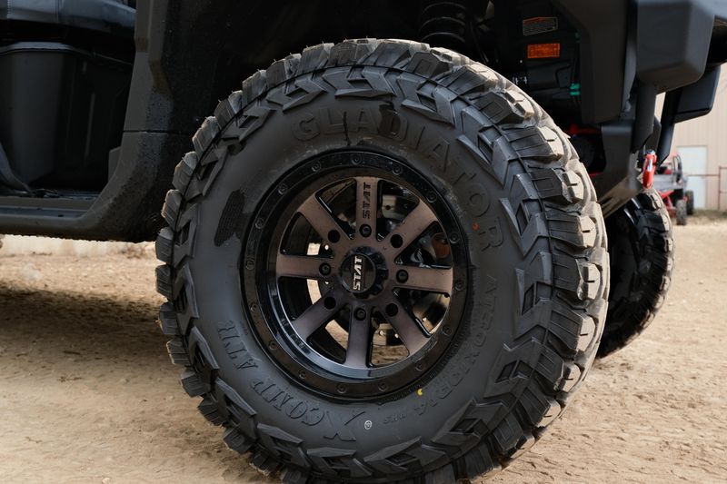 NEW 2026 CAN-AM DEFENDER MAX XT HD11 WITH 1025 INCH TOUCHSCREEN  in a STEALTH BLACK exterior color. Family PowerSports (877) 886-1997 familypowersports.com 