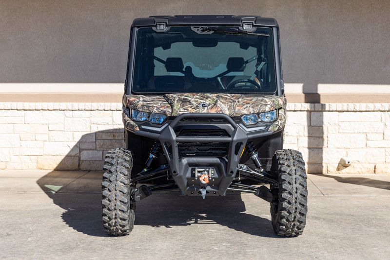 2024 CAN-AM SSV DEF MAX LTD 65 HD10 CA CALI 24 in a CAMO exterior color. Family PowerSports (877) 886-1997 familypowersports.com 