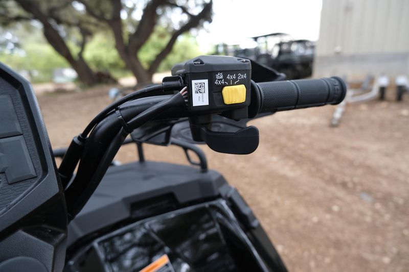 2025 POLARIS SPORTSMAN 570 TRAIL ONYX BLACK in a ONYX BLACK exterior color. Family PowerSports (877) 886-1997 familypowersports.com 