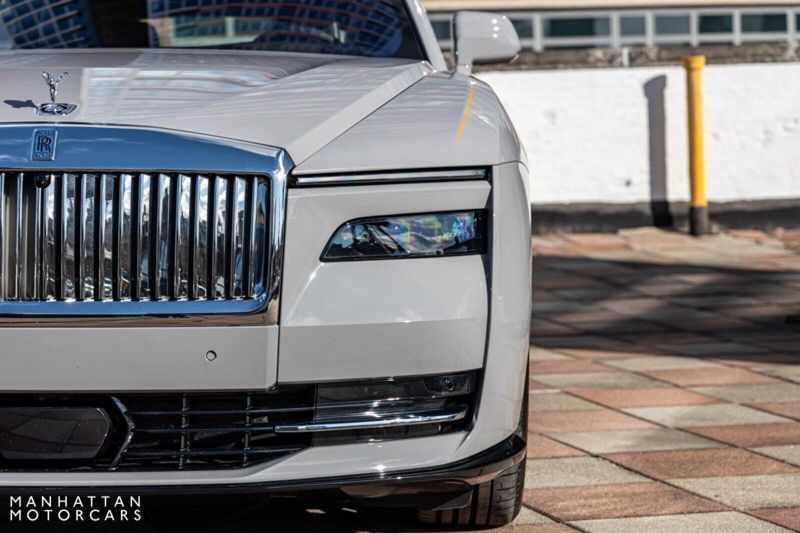 2024 Rolls-Royce Spectre  in a Tempest Grey exterior color and Black with Mandarin Accentsinterior. Lotus Manhattan 347-395-5714 lotusmanhattan.com 