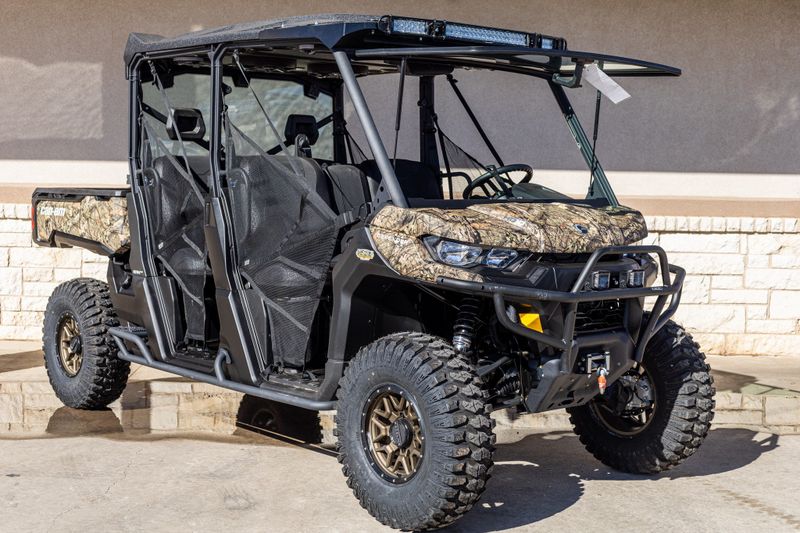 2023 CAN-AM SSV DEF MAX XT 64 HD10 BC CALI 23 in a CAMO exterior color. Family PowerSports (877) 886-1997 familypowersports.com 