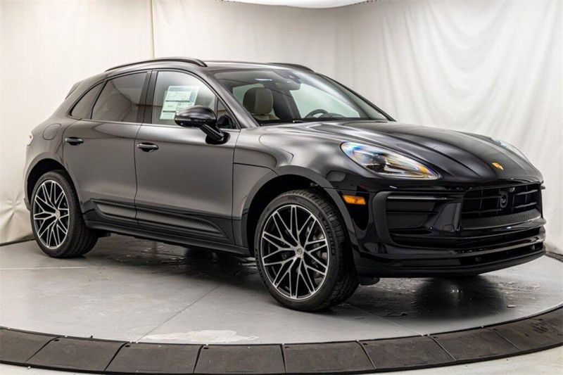 2024 Porsche Macan  in a Jet Black Metallic exterior color and Black/Mojave Beigeinterior. Lotus Manhattan 347-395-5714 lotusmanhattan.com 