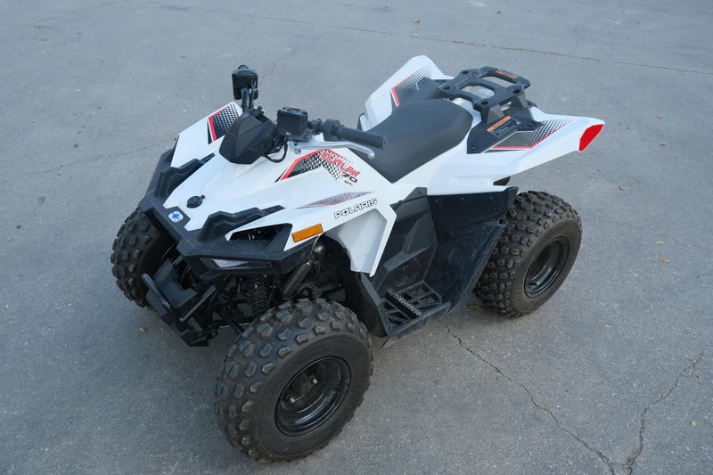 Used 2023 Polaris OUTLAW 70 EFI BRIGHT WHITE AND RED Image 7