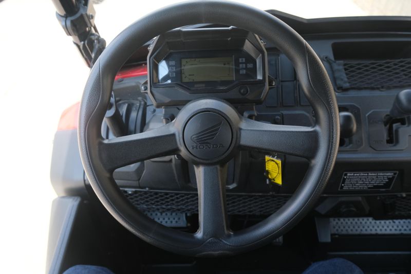 NEW 2026 HONDA PIONEER 7004  in a HERO RED exterior color. Family PowerSports (877) 886-1997 familypowersports.com