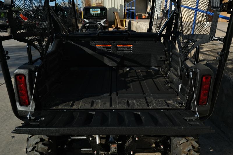 NEW 2026 HONDA PIONEER 7004  in a HERO RED exterior color. Family PowerSports (877) 886-1997 familypowersports.com