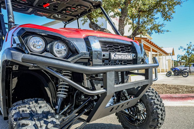 2025 KAWASAKI MULE PROFXT 1000 LE  CANDY PERSIMMON RED in a CANDY PERSIMMON RED exterior color. Family PowerSports (877) 886-1997 familypowersports.com 