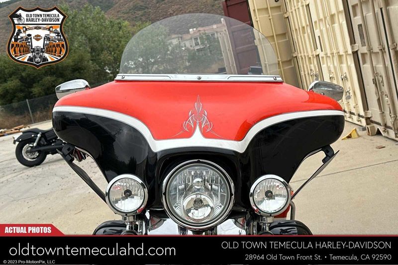 2012 Harley-Davidson Electra Glide in a ELE ORG/BLK DIA W/ PINSTRIP exterior color. BMW Motorcycles of Temecula – Southern California (951) 506-6903 bmwmotorcyclesoftemecula.com 