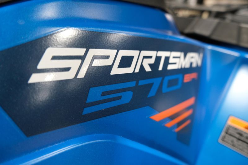 2025 POLARIS SPORTSMAN 570 TRAIL ELECTRIC BLUE in a ELECTRIC BLUE exterior color. Family PowerSports (877) 886-1997 familypowersports.com 