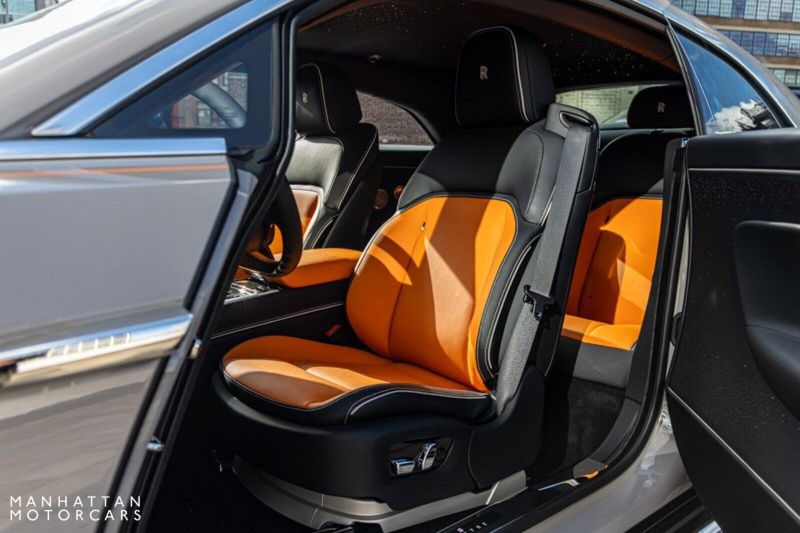 2024 Rolls-Royce Spectre  in a Tempest Grey exterior color and Black with Mandarin Accentsinterior. Lotus Manhattan 347-395-5714 lotusmanhattan.com 