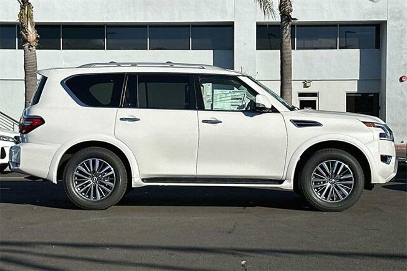 2024 Nissan Armada SL in a Aspen White Tri Coat exterior color and Almondinterior. BEACH BLVD OF CARS beachblvdofcars.com 