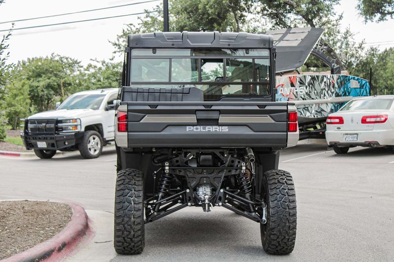 2024 POLARIS RANGER CREW XP 1000 PREM  DESERT SAND in a TAN exterior color. Family PowerSports (877) 886-1997 familypowersports.com 