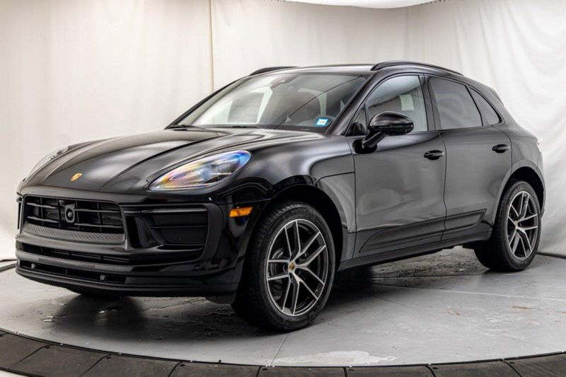 2024 Porsche Macan  in a Black exterior color and Black/Bordeaux Redinterior. Lotus Manhattan 347-395-5714 lotusmanhattan.com 