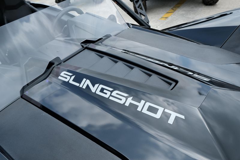 NEW 2025 POLARIS SLINGSHOT SL AUTODRIVE  in a JET BLACK exterior color. Family PowerSports (877) 886-1997 familypowersports.com 