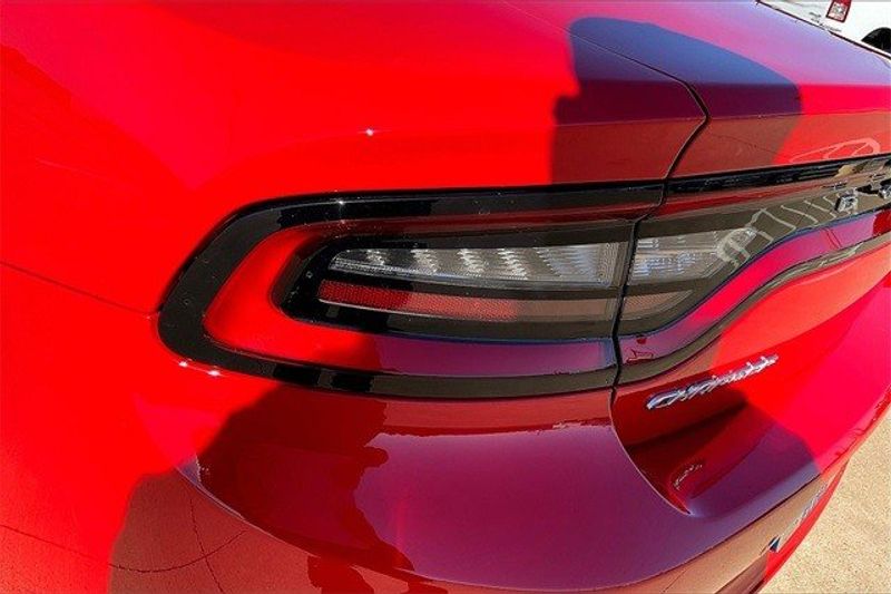 2023 Dodge Charger SXT Rwd in a TorRed exterior color and Blackinterior. Elder CDJR Cedar Creek 430-558-0679 eldercedarcreek.com 