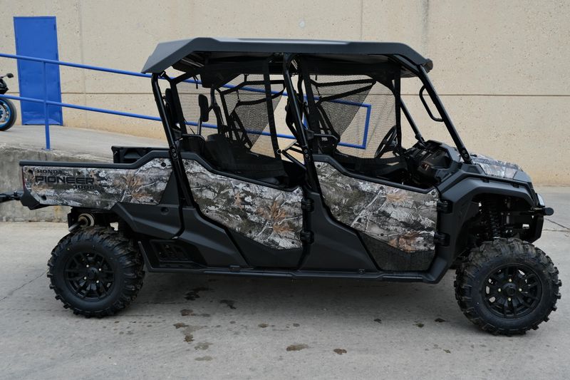 NEW 2025 HONDA PIONEER 10006 DELUXE CREW  in a TRUETIMBER ATERA CAMO exterior color. Family PowerSports (877) 886-1997 familypowersports.com 