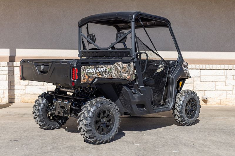 2024 CAN-AM SSV DEF XT 64 HD10 CA 24 in a CAMO exterior color. Family PowerSports (877) 886-1997 familypowersports.com 