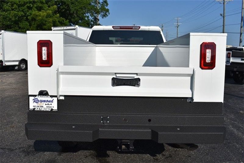 2023 Chevrolet Silverado 2500HD Work Truck in a Summit White exterior color and Blackinterior. Raymond Auto Group 888-703-9950 raymonddeals.com 