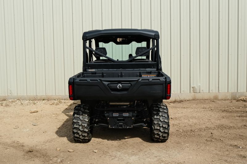 NEW 2026 CAN-AM DEFENDER MAX DPS HD7  in a COMPASS GREEN exterior color. Family PowerSports (877) 886-1997 familypowersports.com 