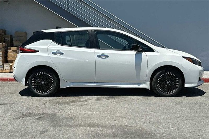 2023 Nissan Leaf SV Plus in a Super Black/Pearl White exterior color and Blackinterior. BEACH BLVD OF CARS beachblvdofcars.com 