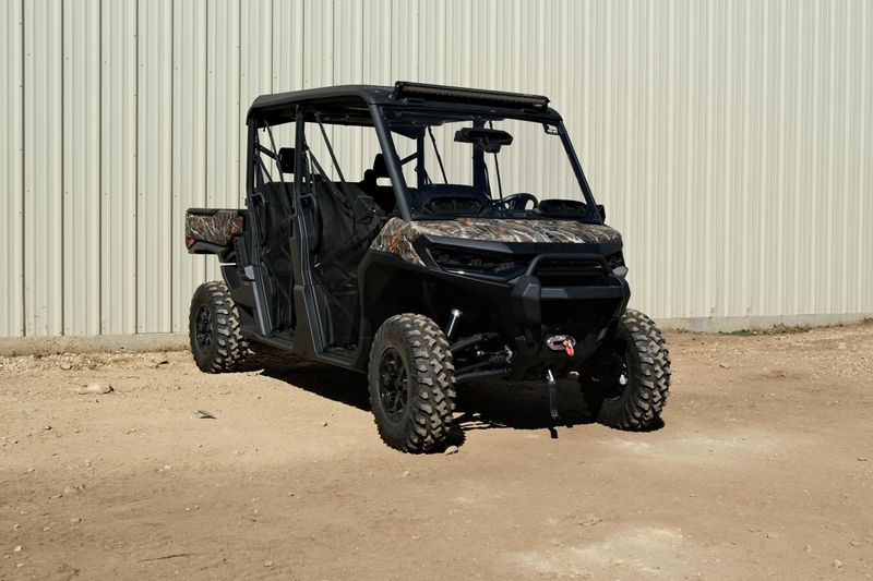 NEW 2026 CAN-AM DEFENDER MAX XT HD11 WITH 1025 INCH TOUCHSCREEN  in a DARK WILDLAND CAMO exterior color. Family PowerSports (877) 886-1997 familypowersports.com 