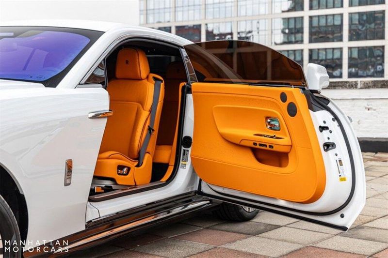 2024 Rolls-Royce Spectre  in a Arctic White exterior color and Mandarininterior. Lotus Manhattan 347-395-5714 lotusmanhattan.com 