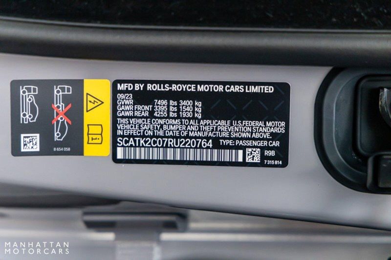 2024 Rolls-Royce Spectre  in a Tempest Grey exterior color and Black with Mandarin Accentsinterior. Lotus Manhattan 347-395-5714 lotusmanhattan.com 