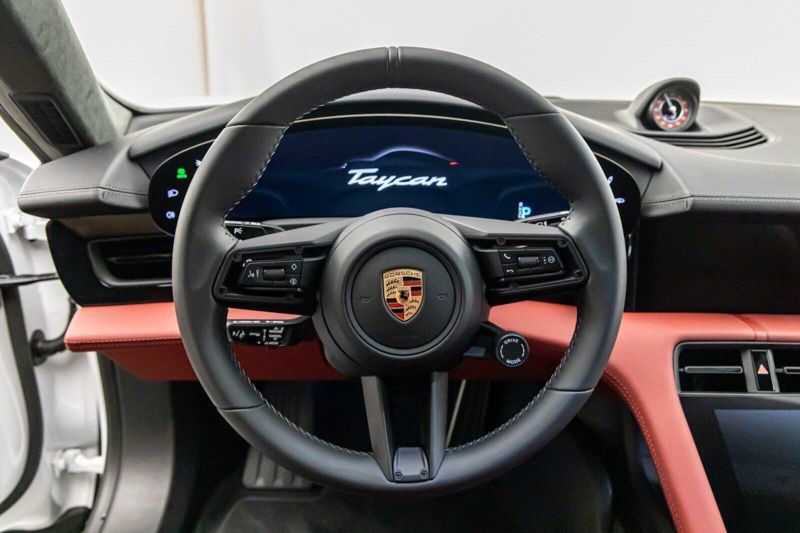 2023 Porsche Taycan GTS in a Carrara White Metallic exterior color and Bordeaux Red/Blackinterior. Lotus Manhattan 347-395-5714 lotusmanhattan.com 