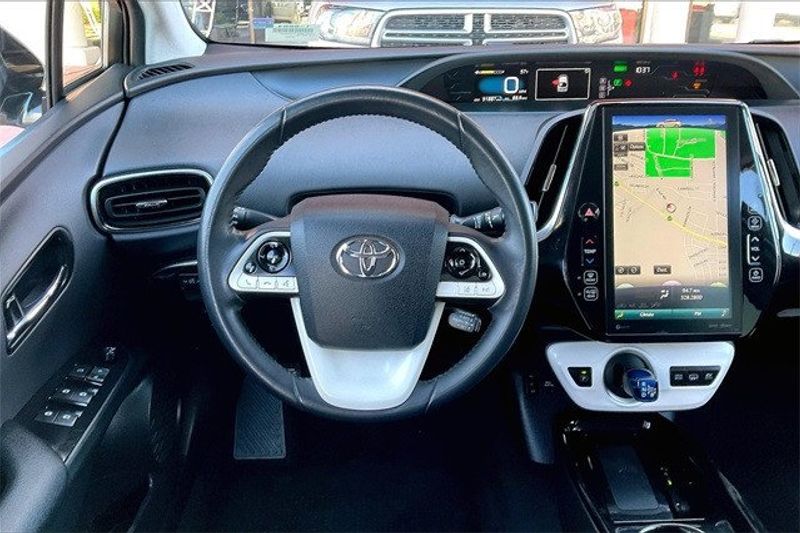 2017 Toyota Prius Prime Advanced in a Classic Silver Metallic exterior color and Blackinterior. Crystal Chrysler Jeep Dodge Ram (760) 507-2975 pixelmotiondemo.com 
