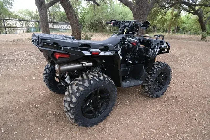 2025 POLARIS SPORTSMAN 570 TRAIL ONYX BLACK in a ONYX BLACK exterior color. Family PowerSports (877) 886-1997 familypowersports.com 