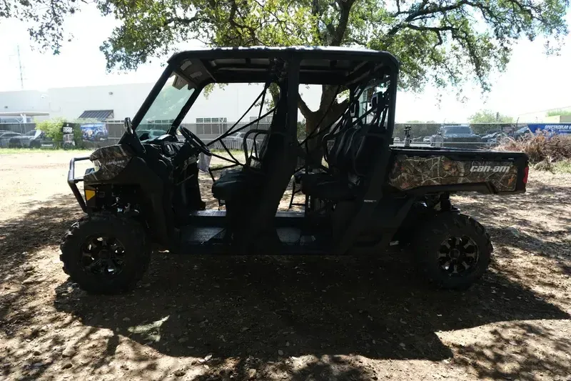 2025 CAN-AM DEFENDER MAX XT HD10 WILDLAND CAMO in a WILDLAND CAMO exterior color. Family PowerSports (877) 886-1997 familypowersports.com 