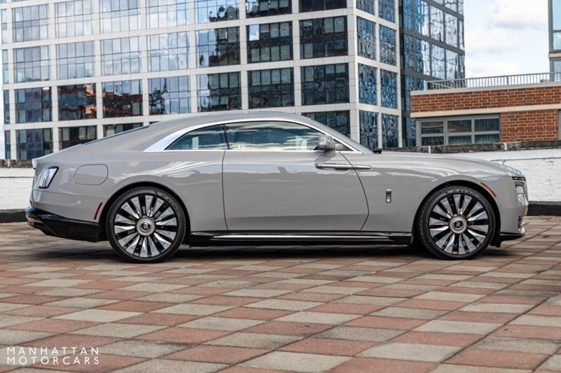 2024 Rolls-Royce Spectre  in a Tempest Grey exterior color and Black with Mandarin Accentsinterior. Lotus Manhattan 347-395-5714 lotusmanhattan.com 